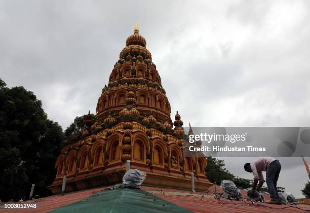 Workers seen during the preparation of Ashadi Ekadashi festival celebration, at Vitthal Mandir, Sinhgad road, on July 20, 2018 in Pune, India....