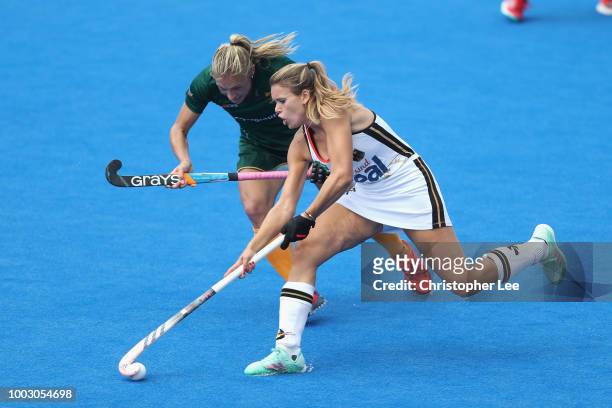 Anne Schroder of Germany battles with Shelley Jones of SA during the Pool C game between Germany and South Africa of the FIH Womens Hockey World Cup...
