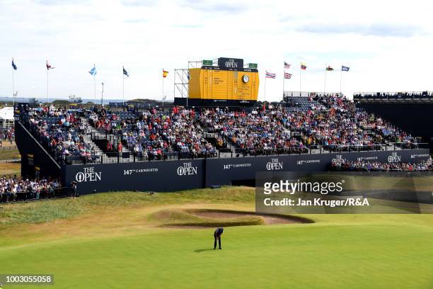Phil Mickelson of the United States putts on the 18th hole green during round three of the Open Championship at Carnoustie Golf Club on July 21, 2018...