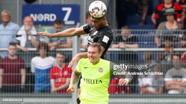 Manuel Schaeffler of SV Wehen Wiesbaden challenges Simon Falette of Eintracht Frankfurt during the Pre Season Friendly Match between SV Wehen...