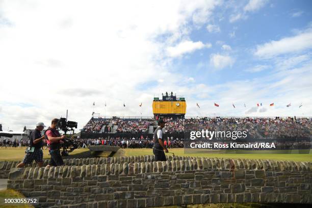 Tiger Woods of the United States makes his way to the 18th hole green during round three of the Open Championship at Carnoustie Golf Club on July 21,...