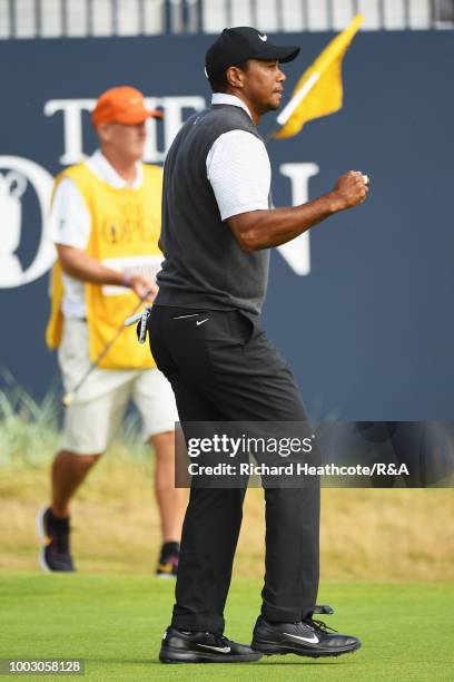 Tiger Woods of the United States reacts on the 18th hole green during round three of the Open Championship at Carnoustie Golf Club on July 21, 2018...