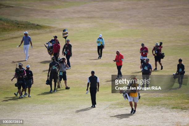 Tiger Woods of the United States walks up the 18th hole fairway during round three of the Open Championship at Carnoustie Golf Club on July 21, 2018...
