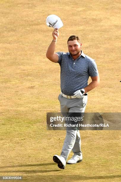 Zander Lombard of South Africa reacts after an eagle on the 18th hole during round three of the Open Championship at Carnoustie Golf Club on July 21,...