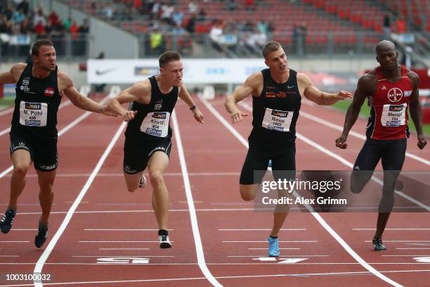 Kevin Kranz of Sprintteam Wetzlar competes to win the men's 100 metres final ahead of Julian Reus of LAC Erfurt during day 2 of the German Athletics...