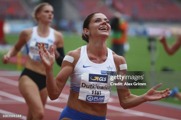 Pamela Dutkiewicz of TV Wattenscheid 01 celebrates winning the women's 100 metres hurdles final during day 2 of the German Athletics Championships at...