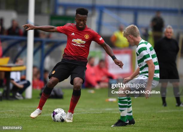 Ethan Laird of Manchester United and Scott Robertson of Celtic during the u19 NI Super Cup gala match at Coleraine Showgrounds on July 21, 2018 in...