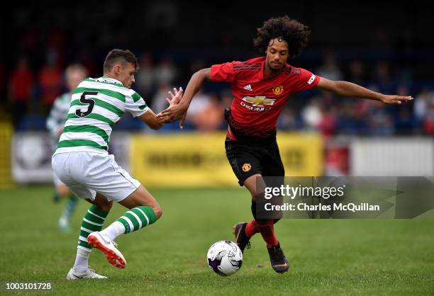 Mani Burghail-Mellor of Manchester United and Wallace Duffy of Celtic during the u19 NI Super Cup gala match at Coleraine Showgrounds on July 21,...