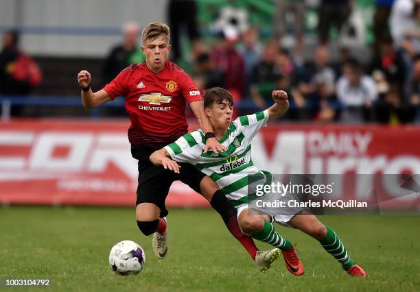 Brandon Williams of Manchester United and Grant Savoury of Celtic during the u19 NI Super Cup gala match at Coleraine Showgrounds on July 21, 2018 in...