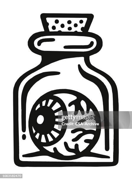 eyeball in a jar - eyeball stock illustrations