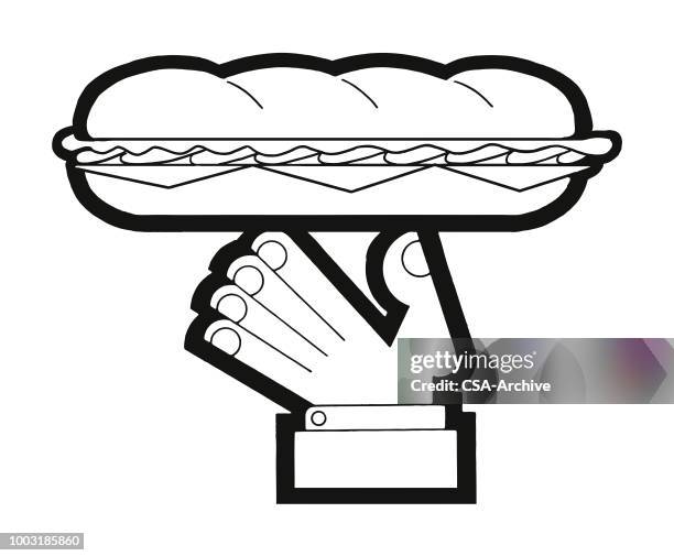 hand holding a submarine sandwich - submarine sandwich stock illustrations