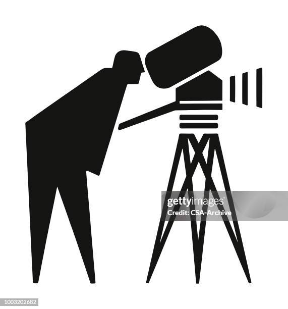 silhouette of a cameraman - cameraman stock illustrations