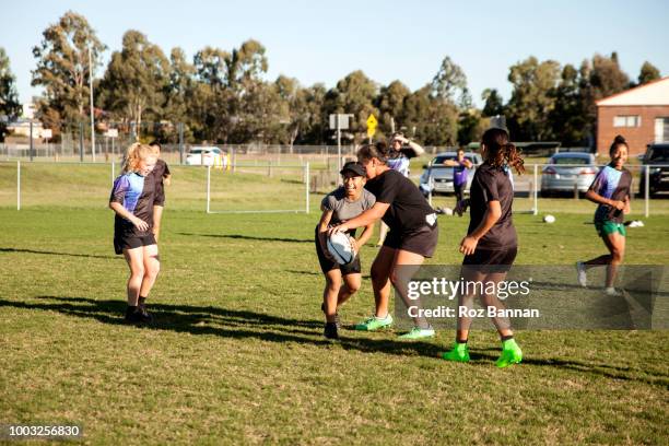 under 13 girls playing rugby in queensland australia - kids sports training stock pictures, royalty-free photos & images