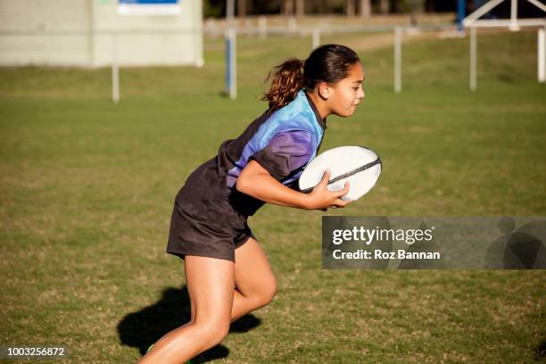 under 13 girls playing rugby in queensland australia - only girls stock pictures, royalty-free photos & images