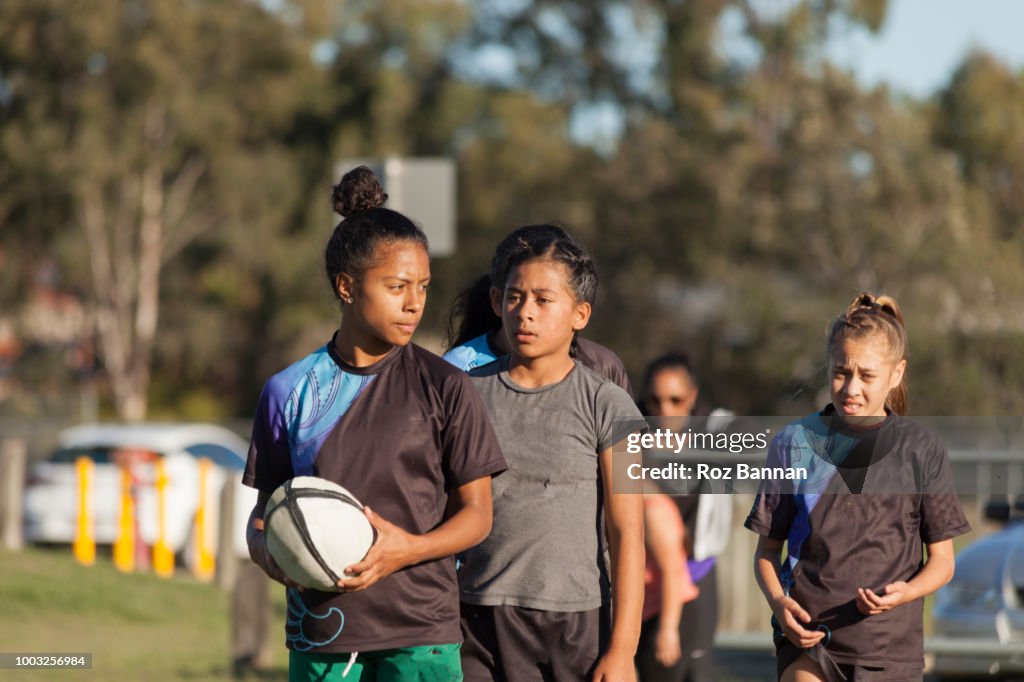 Under 13 girls playing Rugby in Queensland Australia