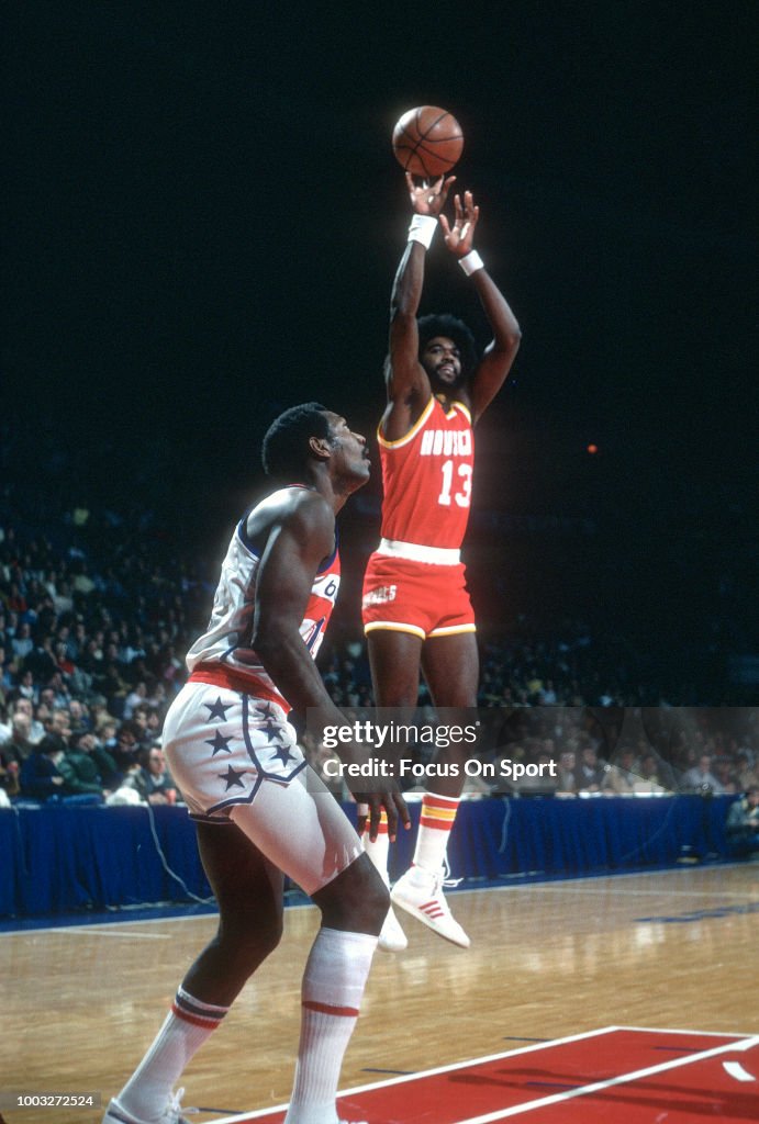 Jones Houston Rockets Dwight Jones of the Houston Rockets shoots over Elvin Hayes of the ...