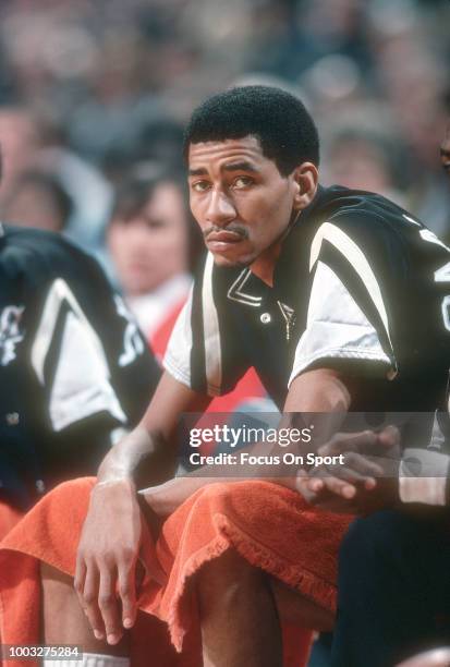 George Gervin of the San Antonio Spurs looks on from the bench against the Washington Bullets during an NBA basketball game circa 1978 at the Capital...