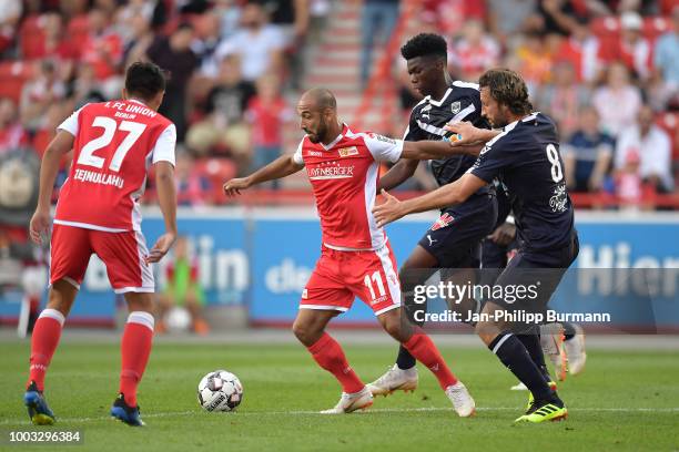 Eroll Zejnullahu, Akaki Gogia of 1 FC Union Berlin, Aurelien Tchouameni and Paul Baysse of FC Girondins Bordeaux during the test match between Union...