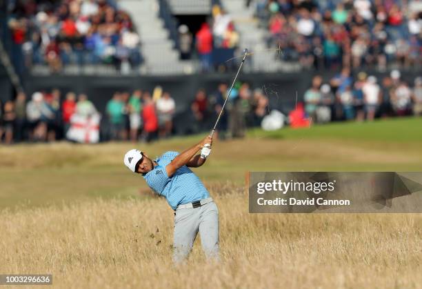 Xander Schauffele of the United States plays his second shot on the 17th hole during the third round of the 147th Open Championship at Carnoustie...