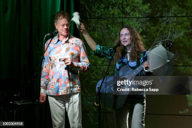 Scott Billington and Johnette Downing perform at Swamp Romp: Louisiana Roots Music for Families at The GRAMMY Museum on July 21, 2018 in Los Angeles,...