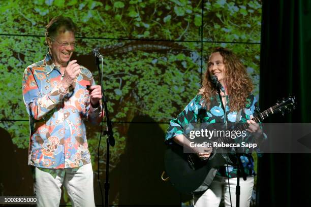 Scott Billington and Johnette Downing perform at Swamp Romp: Louisiana Roots Music for Families at The GRAMMY Museum on July 21, 2018 in Los Angeles,...