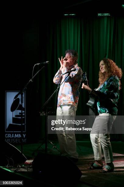 Scott Billington and Johnette Downing perform at Swamp Romp: Louisiana Roots Music for Families at The GRAMMY Museum on July 21, 2018 in Los Angeles,...