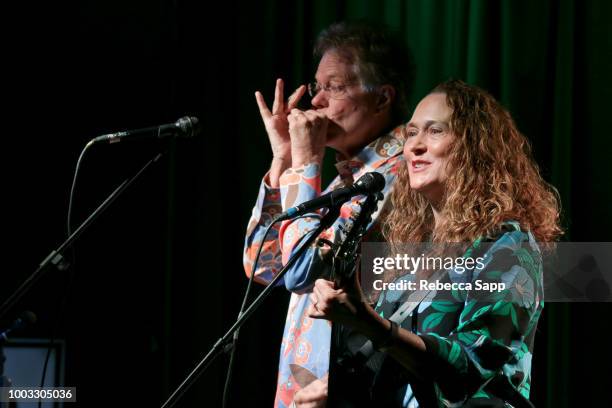 Scott Billington and Johnette Downing perform at Swamp Romp: Louisiana Roots Music for Families at The GRAMMY Museum on July 21, 2018 in Los Angeles,...