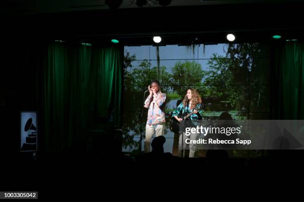 Scott Billington and Johnette Downing perform at Swamp Romp: Louisiana Roots Music for Families at The GRAMMY Museum on July 21, 2018 in Los Angeles,...