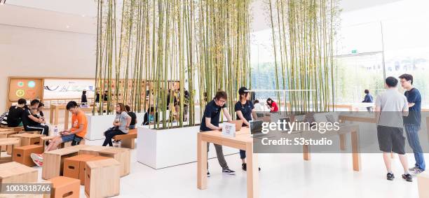 Visitors and buyers at the Apple Inc. Store in Macau, China, on July 18, 2018. As per Apple's financial results for its fiscal 2018 second quarter...