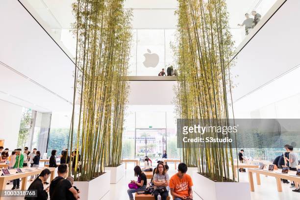 Visitors and buyers at the Apple Inc. Store in Macau, China, on July 18, 2018. As per Apple's financial results for its fiscal 2018 second quarter...