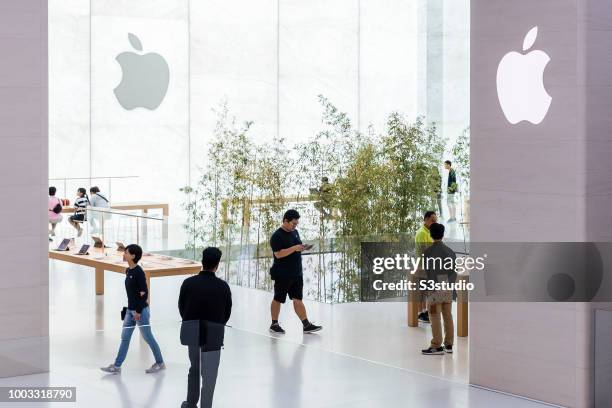 Visitors and buyers at the Apple Inc. Store in Macau, China, on July 18, 2018. As per Apple's financial results for its fiscal 2018 second quarter...
