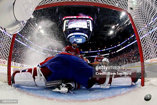 Ville Leino of the Philadelphia Flyers scores a goal past Jaroslav Halak of the Montreal Canadiens in the second period of Game 4 of the Eastern...
