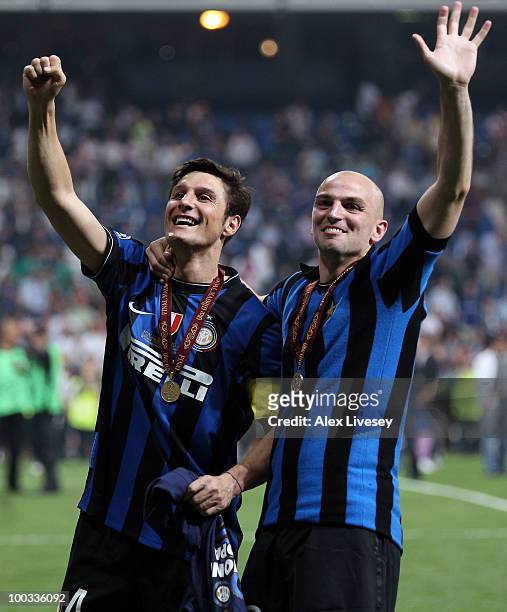 Esteban Cambiasso and Javier Zanetti of Inter Milan celebrate their team's victory at the end of the UEFA Champions League Final match between FC...
