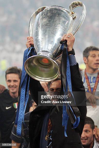 Head coach Jose Mourinho of Inter Milan lifts the UEFA Champions League trophy following their team's victory at the end of the UEFA Champions League...