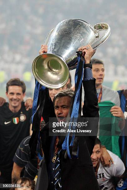 Head coach Jose Mourinho of Inter Milan lifts the UEFA Champions League trophy following their team's victory at the end of the UEFA Champions League...