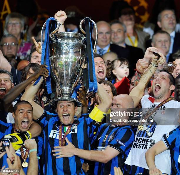 Javier Zanetti of Inter Milan lifts the UEFA Champions League trophy after defeating FC Bayern Muenchen at the UEFA Champions League Final match at...