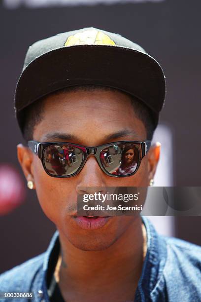 Rapper Pharell arrives to the Rob Dyrdek Foundation's "Sk8 For Life" Benefit at Fantasy Factory on May 22, 2010 in Los Angeles, California.