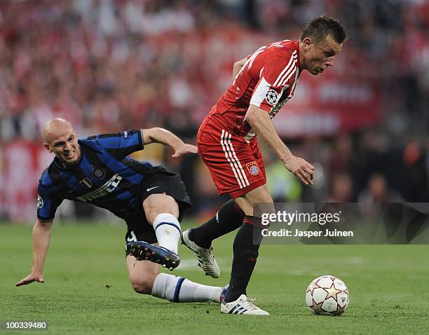 Esteban Cambiasso of Inter Milan is beaten by Ivica Olic of Bayern Munich in action during the UEFA Champions League Final match between FC Bayern...