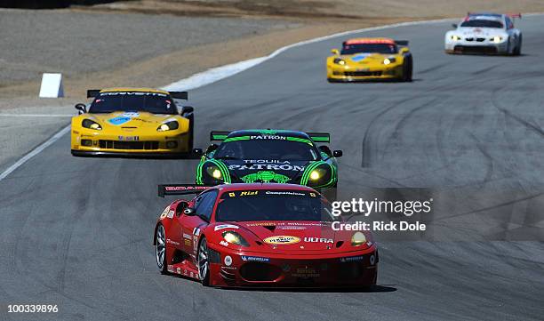 Jaime Melo of Brazil and the Risi Competizione leads the GT field in the opening laps during the American Le Mans Series Monterey at Mazda Raceway...