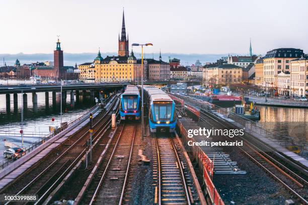 railway tracks and trains in stockholm, sweden - vacation train stock pictures, royalty-free photos & images