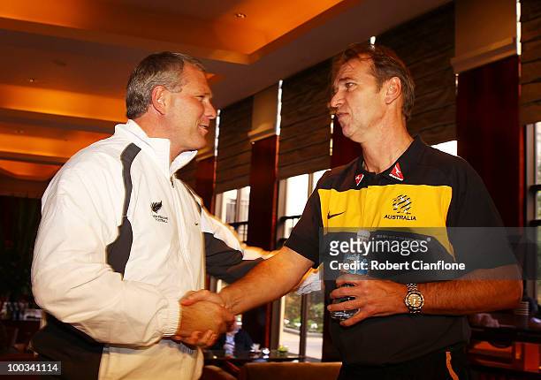New Zealand coach Ricki Herbert greets Australian coach Pim Verbeek prior to a New Zealand All Whites press conference at Park Hyatt Hotel on May 23,...