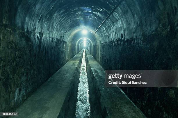 drain in barcelona, spain - sewage stockfoto's en -beelden