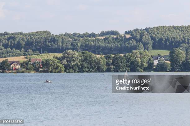 Sailboat on the lake is seen in Chmielno, Kashubia region, Poland on 21 July 2018 Kashubs or Kashubians have their own unique language and...