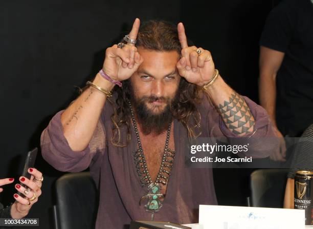 Jason Momoa attends DC Entertainment's Warner Bros. Pictures 'Aquaman' Autograph Signing during Comic-Con International 2018 at San Diego Convention...