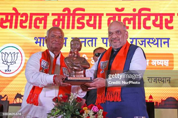 Bhartiya Janta Party President Amit Shah being welcomed by Rajasthan BJP President Madanlal Saini during the 'Social Media Volunteer Meet' in Jaipur,...