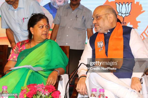 Bhartiya Janta Party President Amit Shah talk with Rajasthan Chief Minister Vasundhara Raje during the closing ceremony of ' State Working Committee...