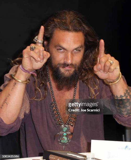 Jason Momoa attends DC Entertainment's Warner Bros. Pictures 'Aquaman' Autograph Signing during Comic-Con International 2018 at San Diego Convention...