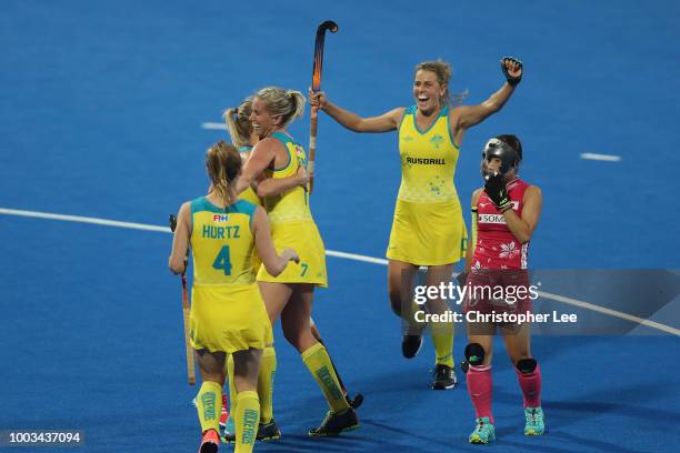 Jodie Kenny of Australia celebrates scoring their third goal during the Pool D game between Australia and Japan of the FIH Womens Hockey World Cup at...