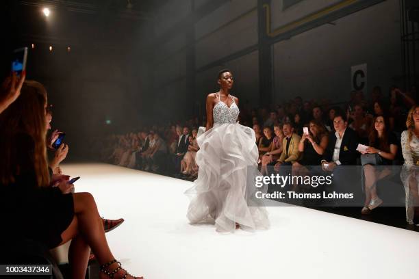 Toni Dreher-Adenuga walks the runway at the Unique by Lexus show during Platform Fashion July 2018 at Areal Boehler on July 21, 2018 in Duesseldorf,...