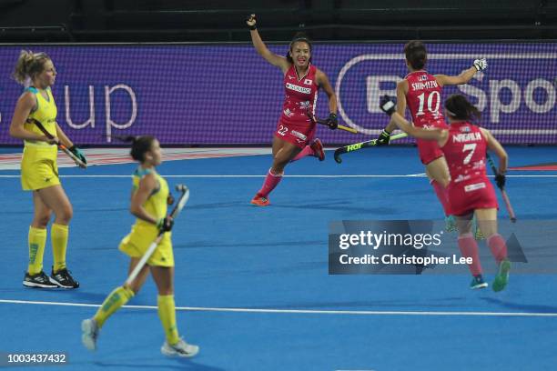 Motomi Kawamura of Japan celebrates scoring their first goal during the Pool D game between Australia and Japan of the FIH Womens Hockey World Cup at...